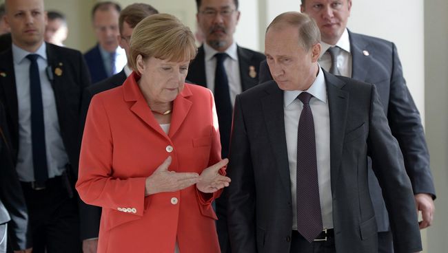 Президент России Владимир Путин и канцлер Германии Ангела Меркель Президент России Владимир Путин и канцлер Германии Ангела Меркель
