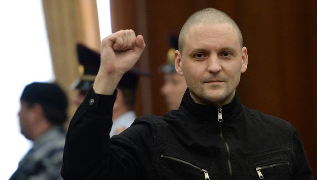Обвиняемый в подготовке массовых беспорядков оппозиционер Сергей Удальцов в здании Мосгорсуд. Архивное фото Обвиняемый в подготовке массовых беспорядков оппозиционер Сергей Удальцов в здании Мосгорсуд. Архивное фото