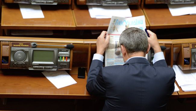 Депутат на заседании Верховной Рады Украины. Архивное фото Депутат на заседании Верховной Рады Украины. Архивное фото