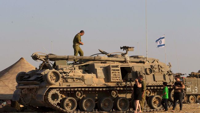 Солдаты израильской армии на юге Израиля, 26 июля 2014 г Солдаты израильской армии на юге Израиля, 26 июля 2014 г
