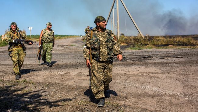 Бойцы народного ополчения в Донецкой области. Архивное фото Бойцы народного ополчения в Донецкой области. Архивное фото