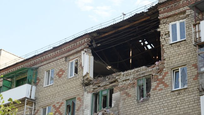Поврежденный во время обстрела жилой дом в Горловке Поврежденный во время обстрела жилой дом в Горловке