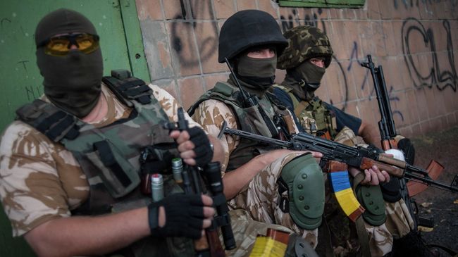 Солдаты украинской армии из батальона Донбасс. Архивное фото Солдаты украинской армии из батальона Донбасс. Архивное фото