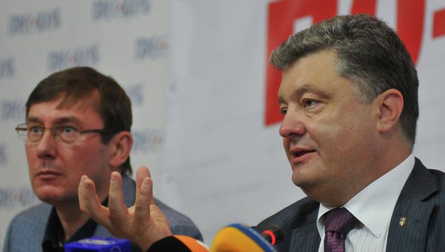 Петр Порошенко и Юрий Луценко. Архивное фото Петр Порошенко и Юрий Луценко. Архивное фото