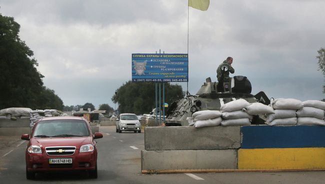 Блокпост украинских силовиков у Мариуполя. 28 августа 2014 Блокпост украинских силовиков у Мариуполя. 28 августа 2014