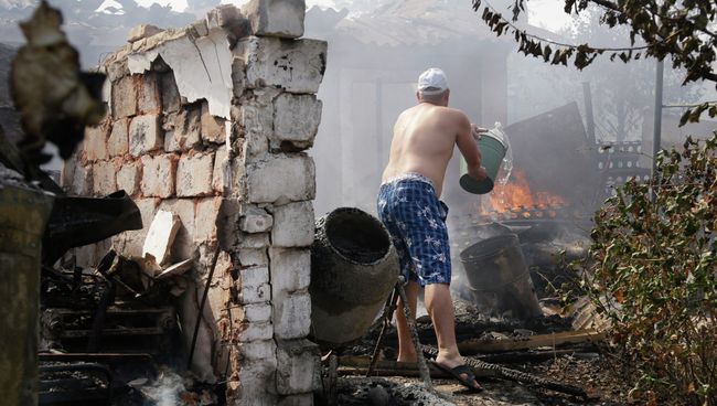 Последствия обстрела Донецка. 7 сентября 2014 Последствия обстрела Донецка. 7 сентября 2014
