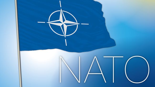 Флаг NATO. Архивное фото Флаг NATO. Архивное фото