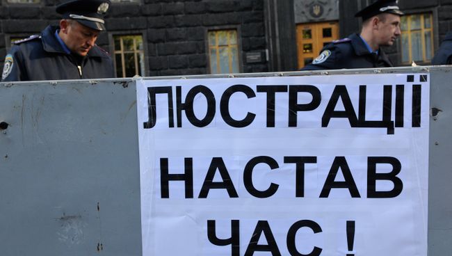 Митинг у здания кабинета министров в Киеве. Архивное фото. Митинг у здания кабинета министров в Киеве. Архивное фото.