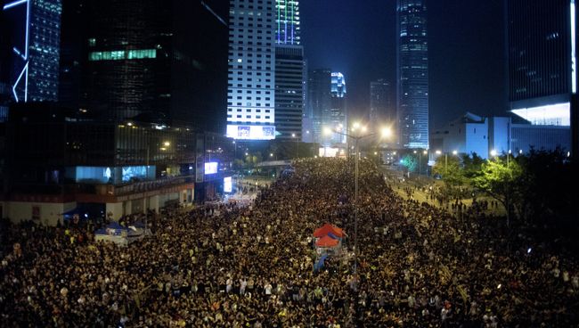 Сторонники протестного движения Occupy Central на митинге в районе Admiralty в Гонконге, Архивное фото Сторонники протестного движения Occupy Central на митинге в районе Admiralty в Гонконге, Архивное фото
