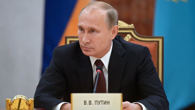 10 октября 2014. Президент России Владимир Путин на заседании Совета глав государств Содружества Независимых Государств (СНГ) в Минске