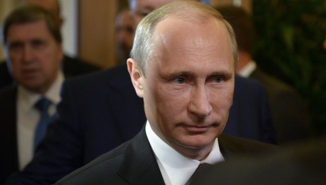 17 октября 2014. Президент РФ Владимир Путин после встречи в нормандском формате в рамках саммита форума Азия-Европа
