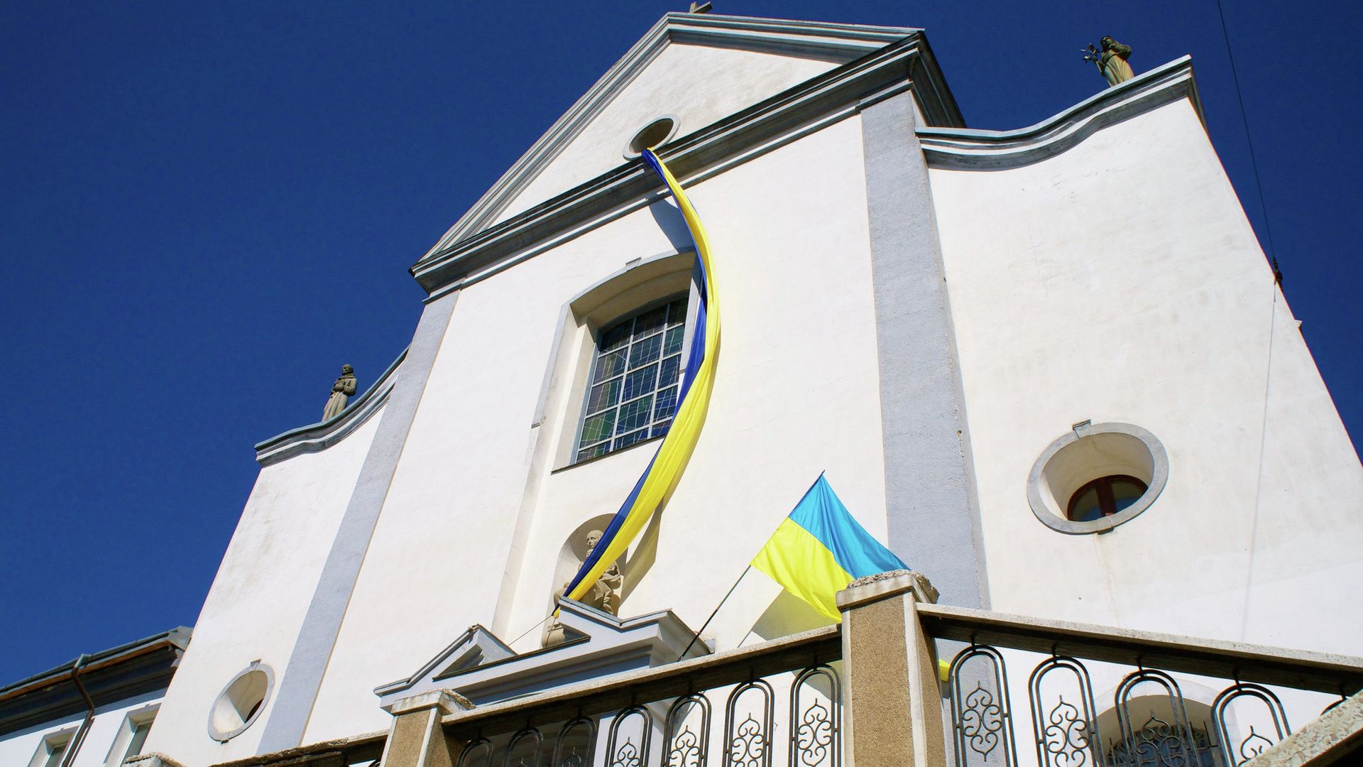 Национальный флаг на здании города Винница, Украина - РИА Новости, 1920, 26.07.2025