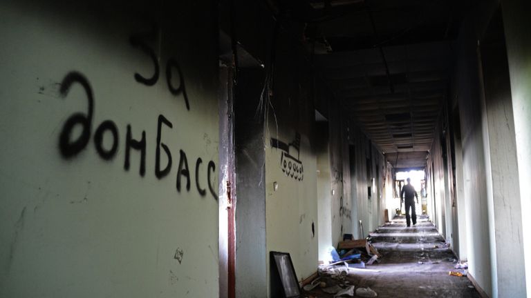 В обгоревшем здании Мариупольского городского совета. 19 мая 2014 В обгоревшем здании Мариупольского городского совета. 19 мая 2014