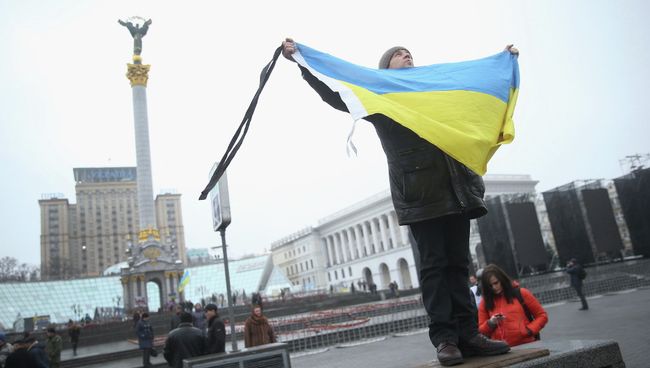 Участник акции, посвященной годовщине событий на площади Независимости в Киеве. Архивное фото Участник акции, посвященной годовщине событий на площади Независимости в Киеве. Архивное фото