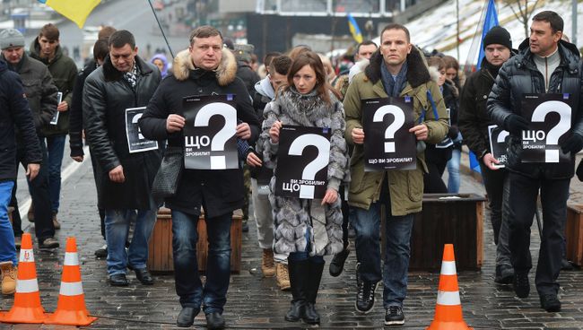 Участники акции Прошел год. Что сделала власть?, посвященной годовщине событий на площади Независимости в Киеве, почтили память погибших. Архивное фото