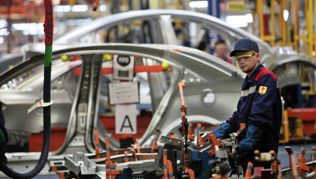 Производство малогабаритных автомобилей на заводе General Motors в производственной зоне Шушары-2 Санкт-Петербурга. Архивное фото Производство малогабаритных автомобилей на заводе General Motors в производственной зоне Шушары-2 Санкт-Петербурга. Архивное фото
