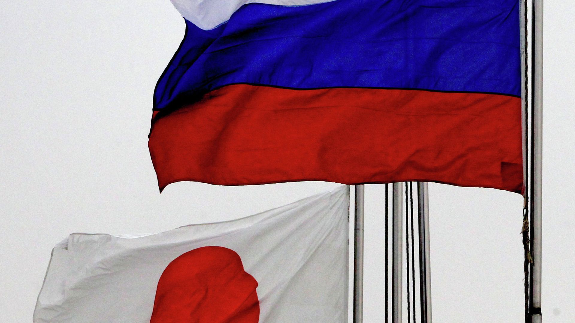 Государственные флаги России и Японии Государственные флаги России и Японии - РИА Новости, 1920, 14.11.2023