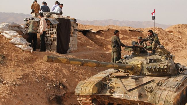 Сирийские военнослужащие на сирийско-ливанской границе Сирийские военнослужащие на сирийско-ливанской границе