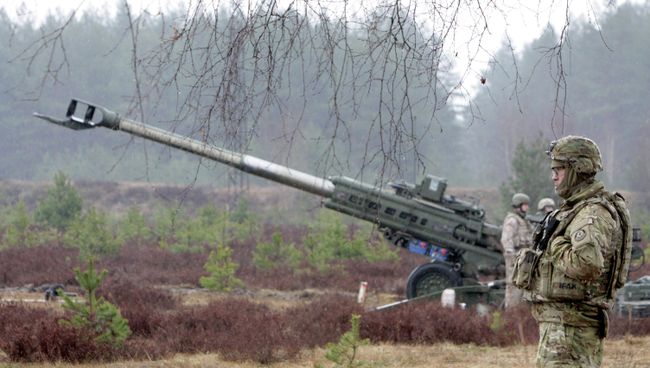 Военнослужащие блока НАТО на военных учениях в Латвии, архивное фото Военнослужащие блока НАТО на военных учениях в Латвии, архивное фото