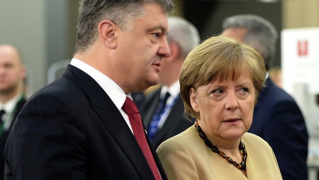 Президент Украины Петр Порошенко и канцлер Германии Ангела Меркель. Архивное фото Президент Украины Петр Порошенко и канцлер Германии Ангела Меркель. Архивное фото