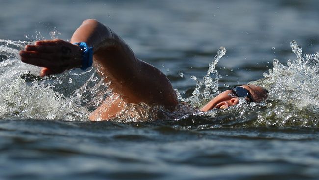 Российская спортсменка Анастасия Крапивина на дистанции 10 км на открытой воде. Архивное фото Российская спортсменка Анастасия Крапивина на дистанции 10 км на открытой воде. Архивное фото