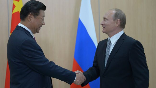 Президент Российской Федерации Владимир Путин и Председатель Китайской Народной Республики Си Цзиньпин. Архивное фото Президент Российской Федерации Владимир Путин и Председатель Китайской Народной Республики Си Цзиньпин. Архивное фото