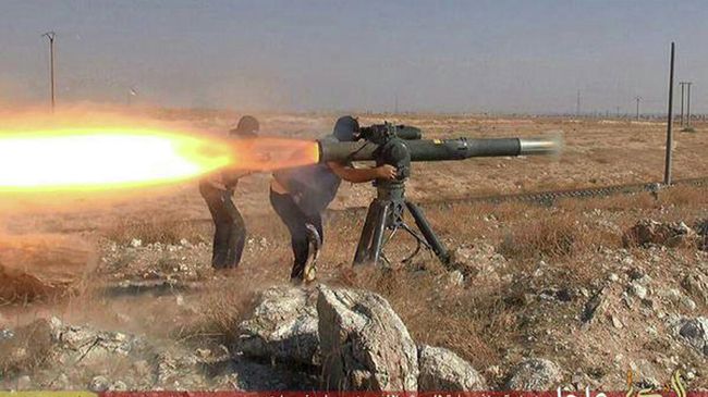 Боевики Исламского государства во время боя в районе города Хасеке на северо-востоке Сирии. Архивное фото Боевики Исламского государства во время боя в районе города Хасеке на северо-востоке Сирии. Архивное фото