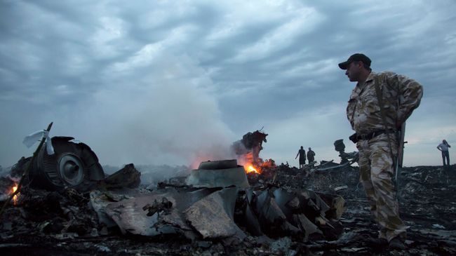 На месте крушения малайзийского самолета Boeing 777 в районе города Шахтерск Донецкой области. Архивное фото На месте крушения малайзийского самолета Boeing 777 в районе города Шахтерск Донецкой области. Архивное фото