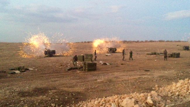 Сирийская артиллерия ведет огонь по террористам на севере провинции Хама Сирийская артиллерия ведет огонь по террористам на севере провинции Хама