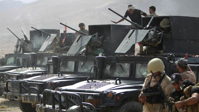 Бойцы местных сил самообороны и военные силы армии Ирака. Архивное фото Бойцы местных сил самообороны и военные силы армии Ирака. Архивное фото