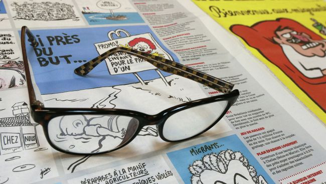 Французское сатирическое издание Charlie Hebdo. Архивное фото Французское сатирическое издание Charlie Hebdo. Архивное фото
