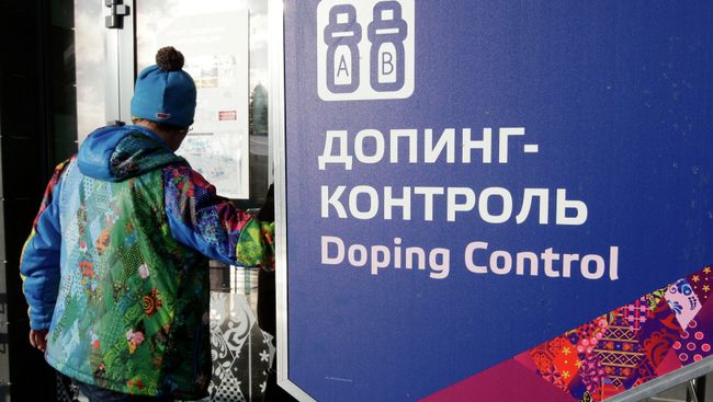 Спортсмен в лыжно-биатлонном комплексе Лаура на Олимпийских играх в Сочи. Архивное фото Спортсмен в лыжно-биатлонном комплексе Лаура на Олимпийских играх в Сочи. Архивное фото