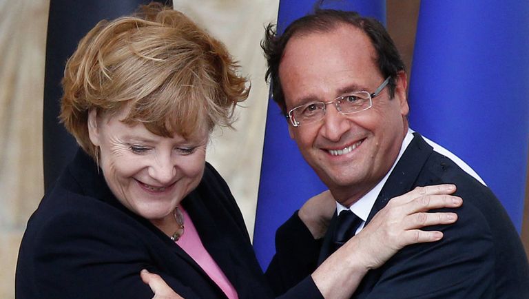 Президент Франции Франсуа Олланд и канцлер Германии Ангела Меркель во время церемонии в честь 50-летия возобновления франко-германских отношений после Второй мировой войны Президент Франции Франсуа Олланд и канцлер Германии Ангела Меркель во время церемонии в честь 50-летия возобновления франко-германских отношений после Второй мировой войны
