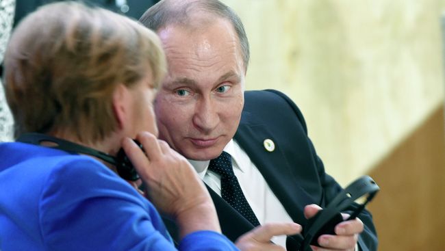 Президент России Владимир Путин и канцлер Германии Ангела Меркель. Архивное фото Президент России Владимир Путин и канцлер Германии Ангела Меркель. Архивное фото