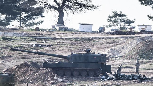 Турецкие военные на границе с Сирией. Архивное фото Турецкие военные на границе с Сирией. Архивное фото