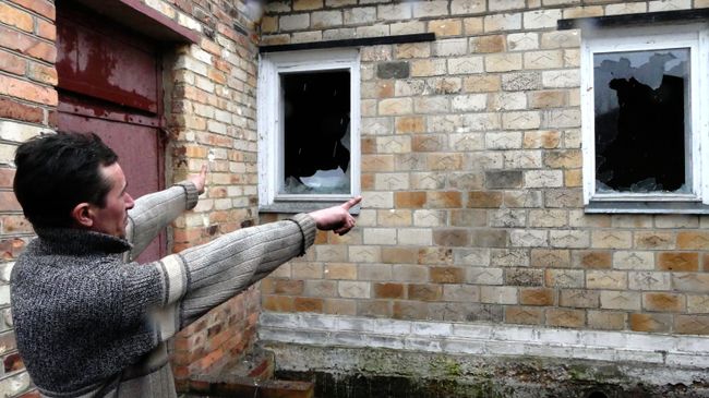 Последствия обстрела поселка Зайцево под Горловкой. Архивное фото Последствия обстрела поселка Зайцево под Горловкой. Архивное фото