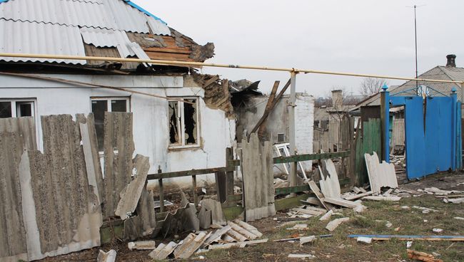 Жилой дом, пострадавший в результате обстрела в Макеевке. Архивное фото Жилой дом, пострадавший в результате обстрела в Макеевке. Архивное фото