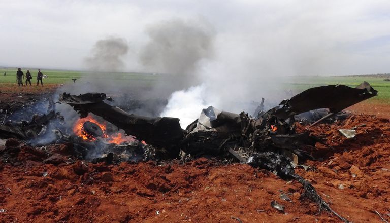Обломки сбитого под Алеппо самолета сирийских ВВС Обломки сбитого под Алеппо самолета сирийских ВВС