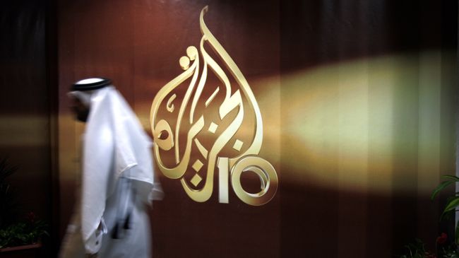 Сотрудник в офисе телекомпании Al Jazeera в Дохе, Катар. Архивное фото Сотрудник в офисе телекомпании Al Jazeera в Дохе, Катар. Архивное фото