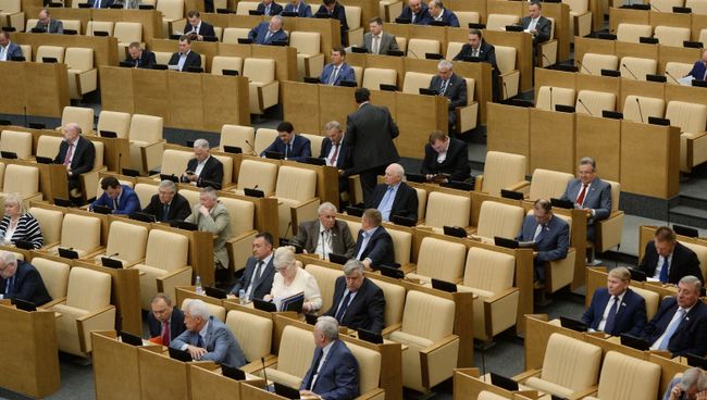 Депутаты на пленарном заседании Государственной Думы. Архивное фото Депутаты на пленарном заседании Государственной Думы. Архивное фото
