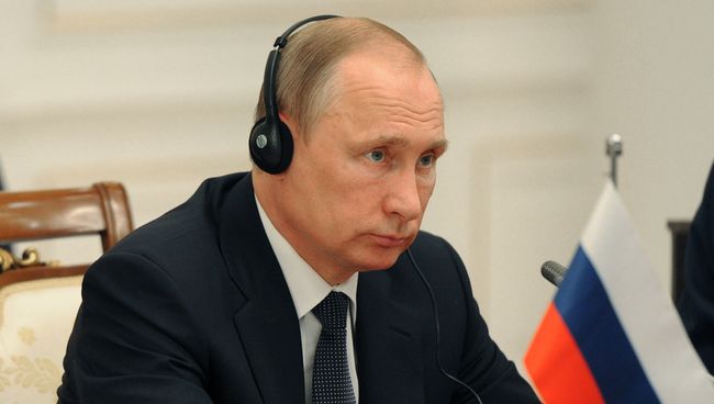 Президент РФ Владимир Путин во время встречи в Ташкенте с председателем КНР Си Цзиньпином и президентом Республики Монголия Цахиагийном Элбэгдоржем. 23 июня 2016 Президент РФ Владимир Путин во время встречи в Ташкенте с председателем КНР Си Цзиньпином и президентом Республики Монголия Цахиагийном Элбэгдоржем. 23 июня 2016