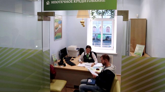 Работа Сбербанка в Санкт-Петербурге. Архивное фото Работа Сбербанка в Санкт-Петербурге. Архивное фото