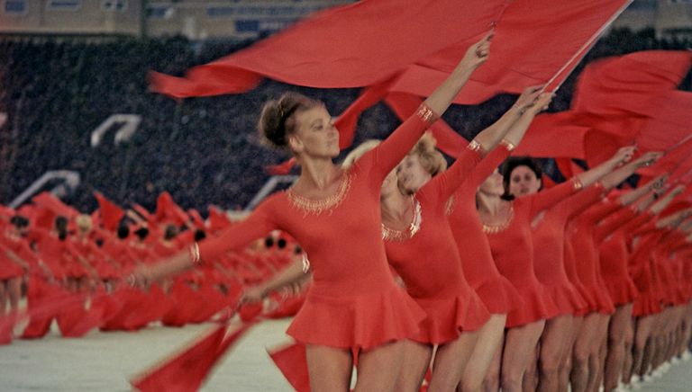 Выступление гимнастов на церемонии открытия IV летней Спартакиады народов СССР. Центральный стадион имени В.И. Ленина (ныне стадион Лужники) Выступление гимнастов на церемонии открытия IV летней Спартакиады народов СССР. Центральный стадион имени В.И. Ленина (ныне стадион Лужники)