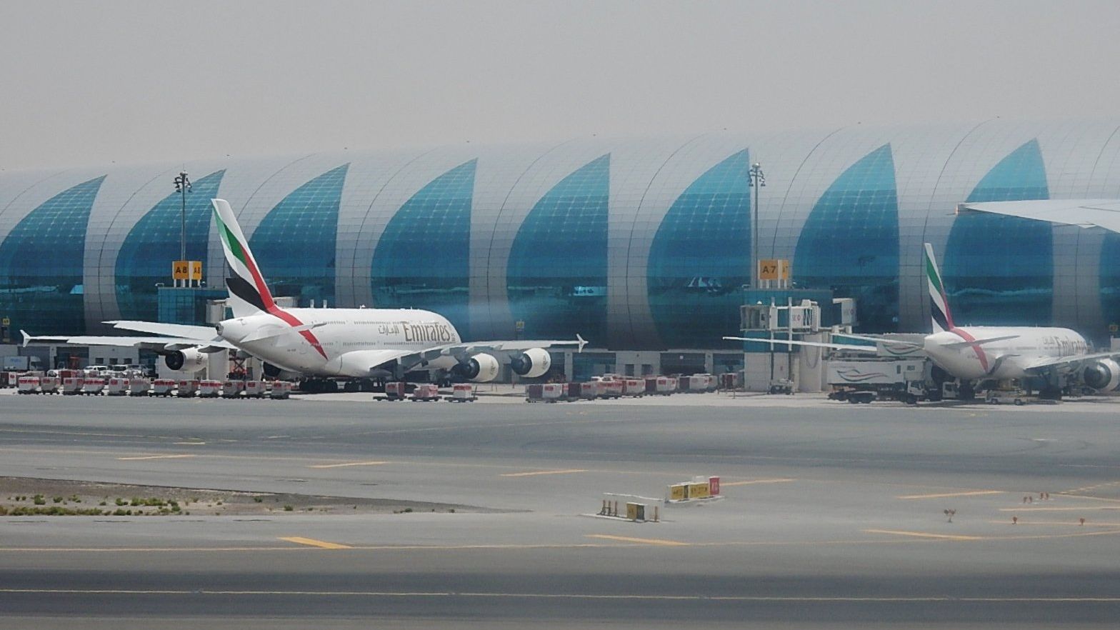 Самолеты авиакомпании Emirates в аэропорту Дубая Самолеты авиакомпании Emirates в аэропорту Дубая - РИА Новости, 1920, 05.12.2022