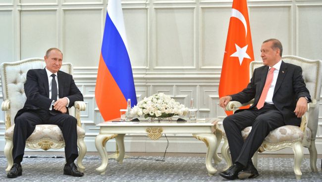 Президент России Владимир Путин и президент Турции Реджеп Тайип Эрдоган во время встречи в Баку. 13 июня 2015 года Президент России Владимир Путин и президент Турции Реджеп Тайип Эрдоган во время встречи в Баку. 13 июня 2015 года