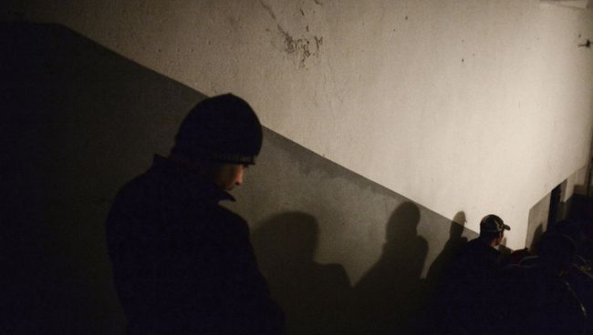 Иностранные рабочие в общежитии для мигрантов в Москве Иностранные рабочие в общежитии для мигрантов в Москве