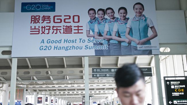 Билборд с приветствием участником саммита G20 в аэропорту китайского Ханьчжоу . Архивное фото Билборд с приветствием участником саммита G20 в аэропорту китайского Ханьчжоу . Архивное фото
