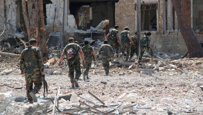 Сирийская армия освободила от боевиков территорию военных училищ в Алеппо. Архивное фото Сирийская армия освободила от боевиков территорию военных училищ в Алеппо. Архивное фото