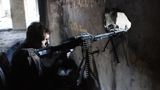 Военнослужащий сирийской армии. Архивное фото Военнослужащий сирийской армии. Архивное фото