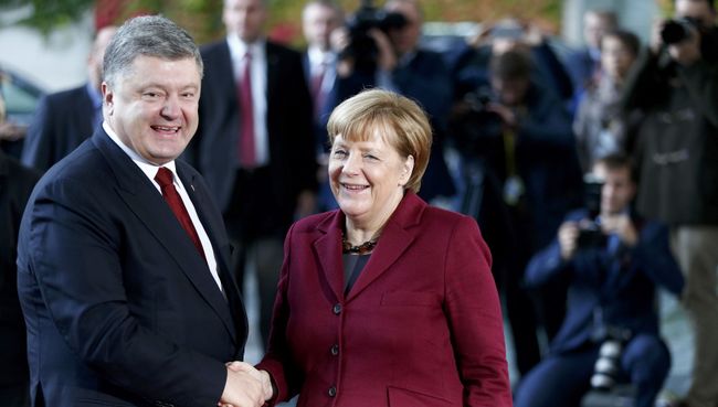 Канцлер Германии Ангела Меркель и президент Украины Петр Порошенко. Архивное фото Канцлер Германии Ангела Меркель и президент Украины Петр Порошенко. Архивное фото